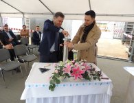UROCZYSTE WMUROWANIE KAMIENIA WĘGIELNEGO POD BUDOWĘ FIRMY DAFI PRO S.A.